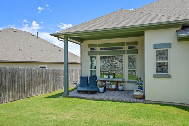 147 Epoch Dr, Austin, TX 78737 - back of house featuring stucco siding and roof with shingles