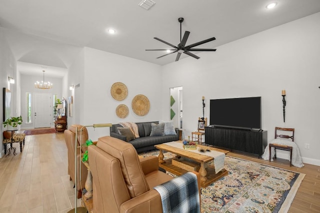 147 Epoch Dr, Austin, TX 78737 - living area featuring light wood-style floors, a chandelier, ceiling fan, recessed lighting, and baseboards