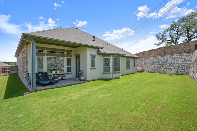 147 Epoch Dr, Austin, TX 78737 - rear view of property with stucco siding and roof with shingles