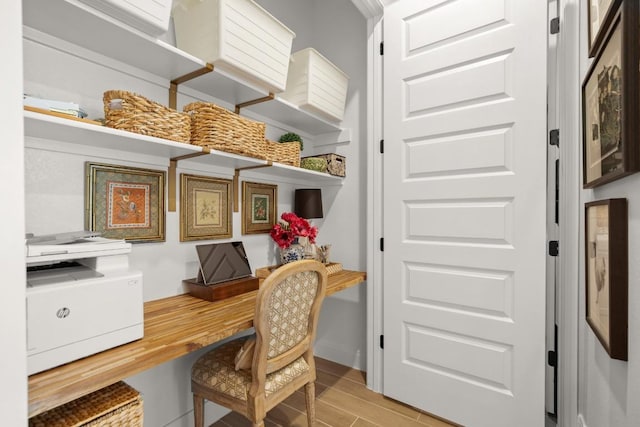 147 Epoch Dr, Austin, TX 78737 - home office featuring built in desk and light wood-style floors