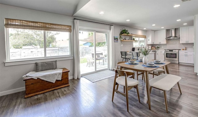 10500 Berthound Dr, Austin, TX 78758 - dining room with wood finished floors and recessed lighting