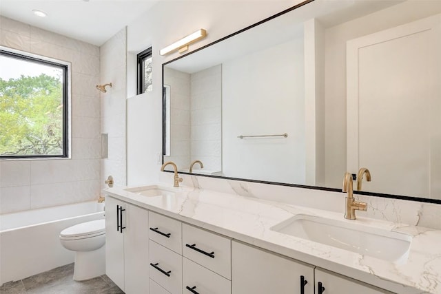 3208 Clawson Rd Unit 2, Austin, TX 78704 - full bathroom featuring toilet, double vanity, and washtub / shower combination