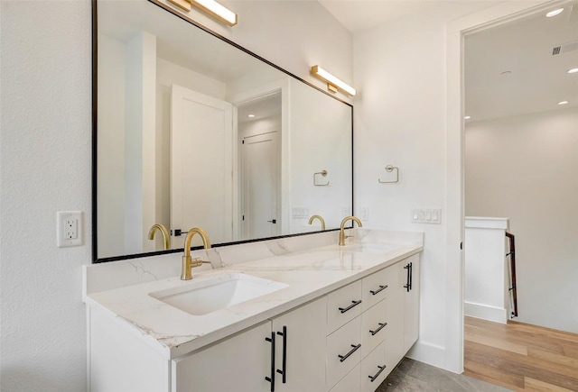 3208 Clawson Rd Unit 2, Austin, TX 78704 - bathroom with double vanity and wood finished floors
