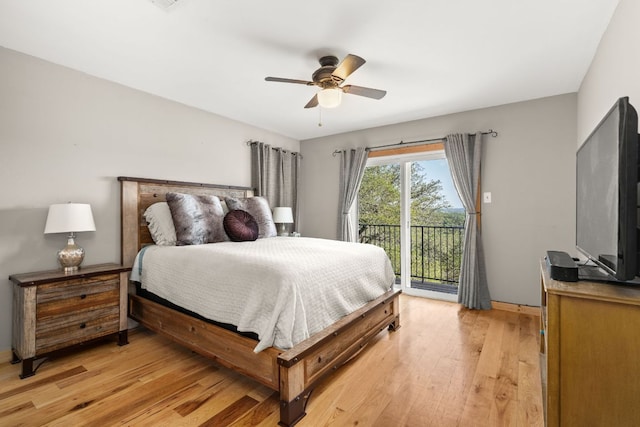 bedroom with access to exterior, light wood-type flooring, and a ceiling fan