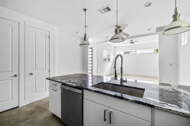 1314 Delano St Unit B, Austin, TX 78721 - kitchen with dishwasher, a sink, a ceiling fan, pendant lighting, and dark stone counters