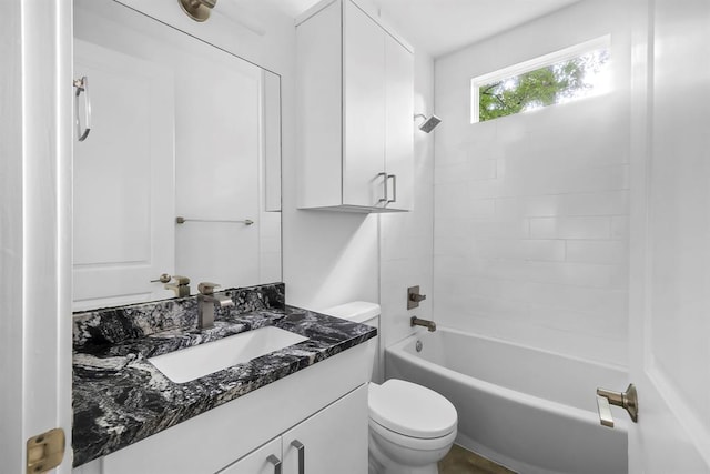 1314 Delano St Unit B, Austin, TX 78721 - bathroom featuring toilet,  shower combination, and vanity