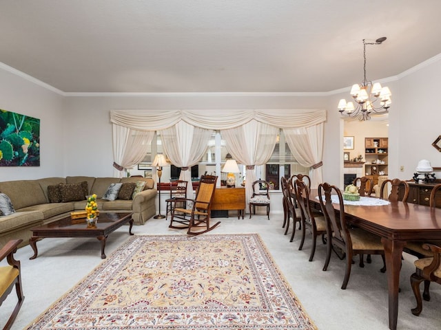 101 Chickadee Cv, Georgetown, TX 78633 - living area featuring crown molding, a chandelier, and light carpet