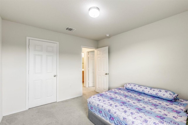 11905 Reindeer Dr, Austin, TX 78754 - bedroom featuring light colored carpet and baseboards