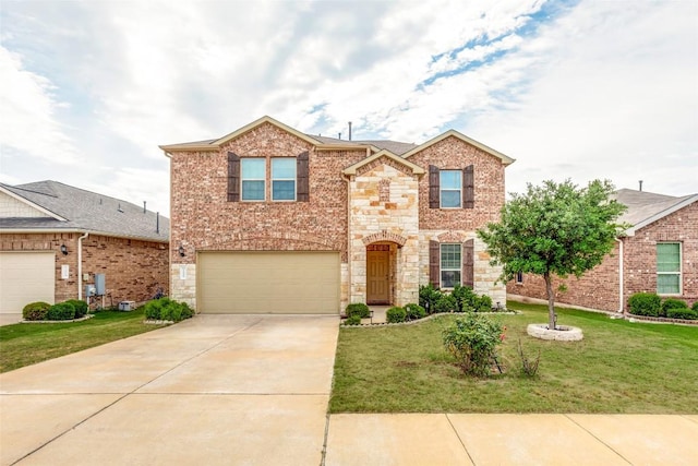 11905 Reindeer Dr, Austin, TX 78754 - traditional-style house featuring concrete driveway, a front lawn, an attached garage, and stone siding