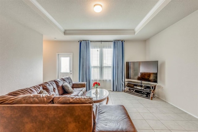 11905 Reindeer Dr, Austin, TX 78754 - living room featuring a raised ceiling, ornamental molding, and light tile patterned floors