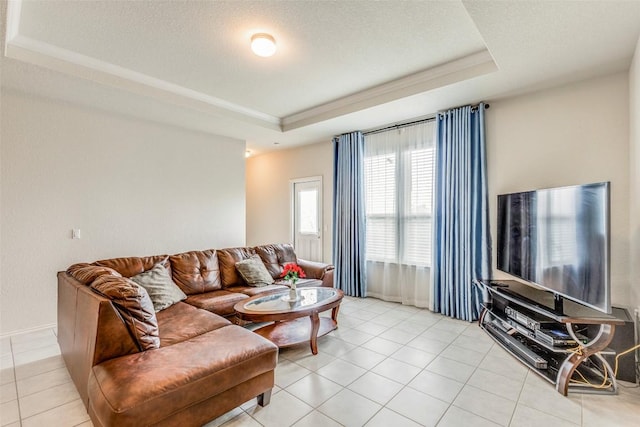 11905 Reindeer Dr, Austin, TX 78754 - living area featuring a raised ceiling and light tile patterned flooring