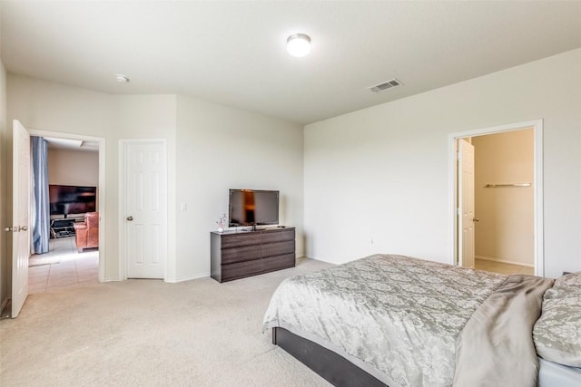 11905 Reindeer Dr, Austin, TX 78754 - bedroom featuring light colored carpet and baseboards