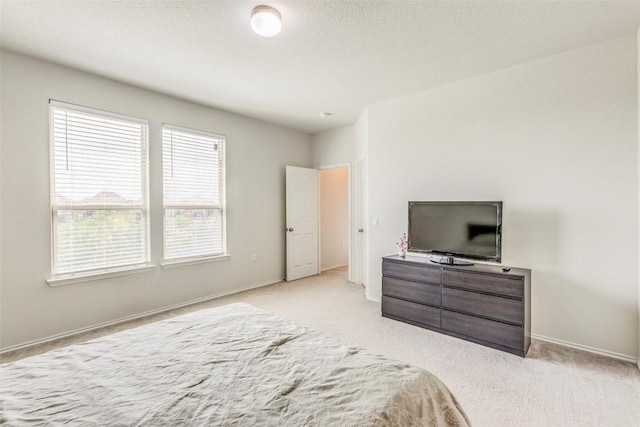 11905 Reindeer Dr, Austin, TX 78754 - carpeted bedroom featuring baseboards