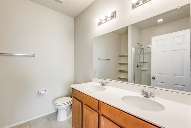 11905 Reindeer Dr, Austin, TX 78754 - bathroom featuring a shower stall, tile patterned flooring, and double vanity