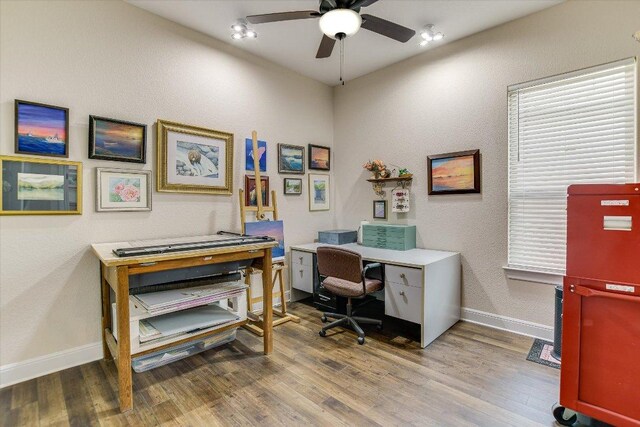 19440 Serenity Ln, Lago Vista, TX 78645 - office area with ceiling fan, wood finished floors, and baseboards