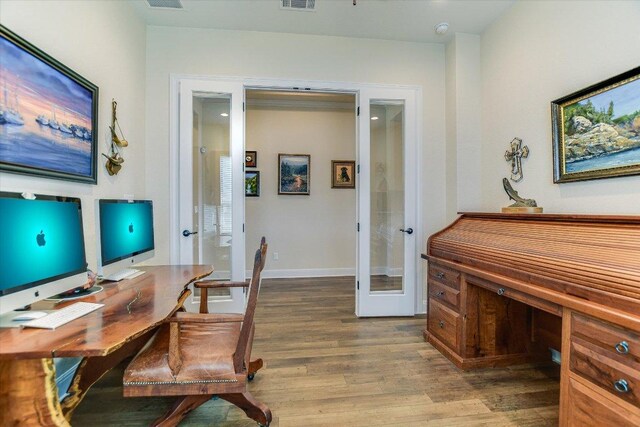 19440 Serenity Ln, Lago Vista, TX 78645 - office area featuring french doors and wood finished floors