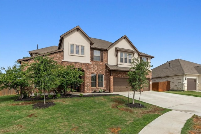 view of front of home featuring concrete driveway, brick siding, an attached garage, and stucco siding