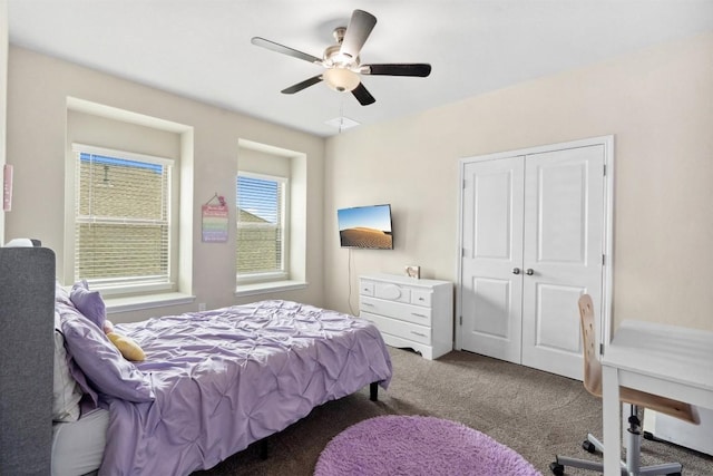 carpeted bedroom with ceiling fan