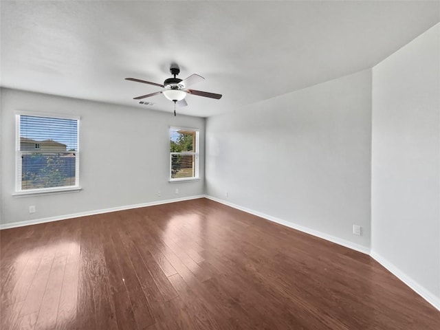 324 Pack Horse Dr, Bastrop, TX 78602 - unfurnished room with a ceiling fan and dark wood-style floors