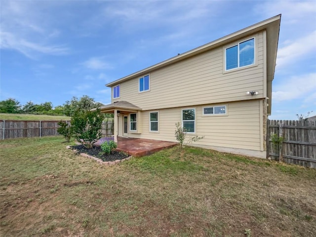 324 Pack Horse Dr, Bastrop, TX 78602 - rear view of house featuring a patio area and a fenced backyard