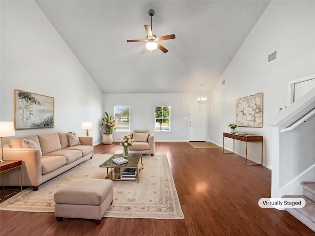 324 Pack Horse Dr, Bastrop, TX 78602 - living room with high vaulted ceiling, stairway, ceiling fan, and wood finished floors