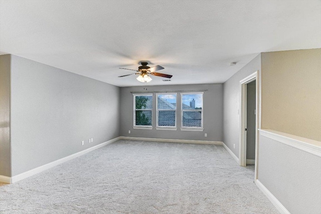 468 Monahans Dr, Georgetown, TX 78628 - empty room with ceiling fan, carpet floors, and baseboards