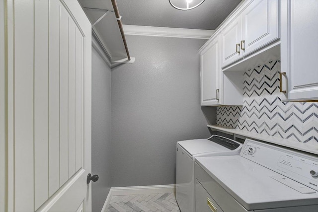 468 Monahans Dr, Georgetown, TX 78628 - laundry room with washer and clothes dryer, ornamental molding, and cabinet space