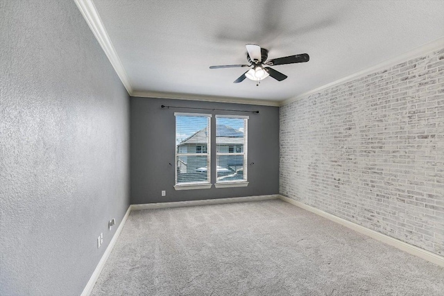 468 Monahans Dr, Georgetown, TX 78628 - carpeted spare room with a ceiling fan, crown molding, baseboards, a textured ceiling, and a textured wall
