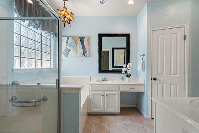 1502 Azalea Dr, Cedar Park, TX 78613 - bathroom with vanity, a textured wall, tile patterned flooring, a shower with door, and recessed lighting