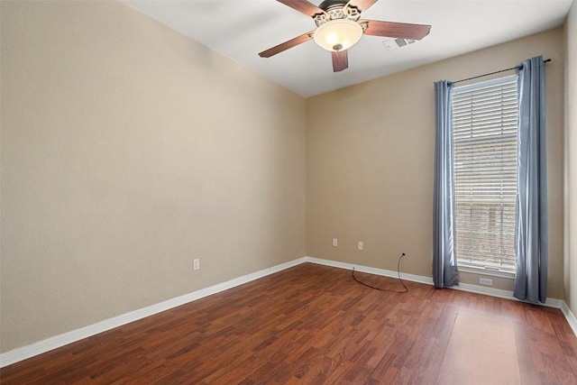 1502 Azalea Dr, Cedar Park, TX 78613 - empty room featuring dark wood-style flooring, healthy amount of natural light, and baseboards