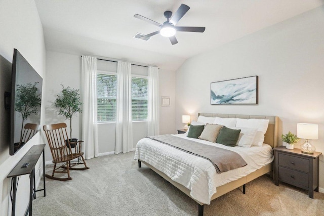 2024 Cantonata Dr, Leander, TX 78641 - bedroom with light colored carpet, vaulted ceiling, and ceiling fan
