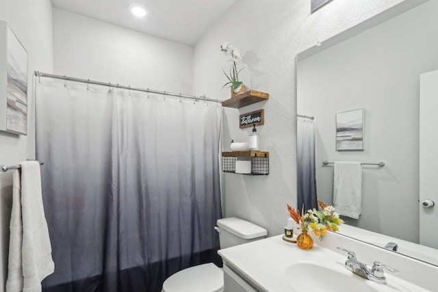 2024 Cantonata Dr, Leander, TX 78641 - bathroom featuring vanity, a shower with shower curtain, and recessed lighting