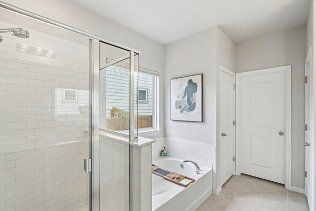 2024 Cantonata Dr, Leander, TX 78641 - full bathroom with a bath, a stall shower, and tile patterned floors