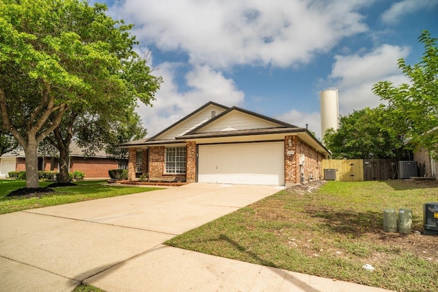 1420 Marsh Harbour Dr, Round Rock, TX 78664 - single story home with brick siding, a garage, driveway, a gate, and central AC unit