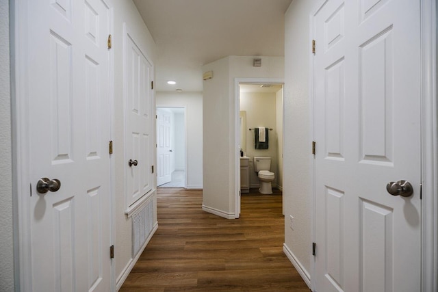1420 Marsh Harbour Dr, Round Rock, TX 78664 - hall featuring dark wood-style flooring, baseboards, and recessed lighting