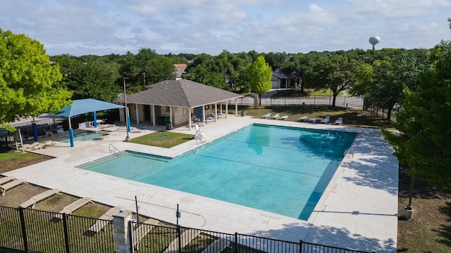 1420 Marsh Harbour Dr, Round Rock, TX 78664 - community pool featuring a patio and fence