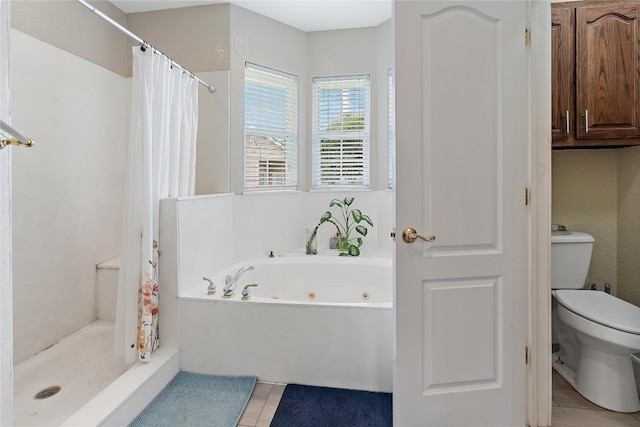 3424 S Old Bastrop Hwy, San Marcos, TX 78666 - bathroom with toilet, a shower stall, a whirlpool tub, and tile patterned floors