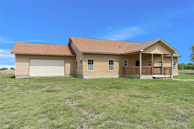 3424 S Old Bastrop Hwy, San Marcos, TX 78666 - rear view of house featuring a garage and a yard