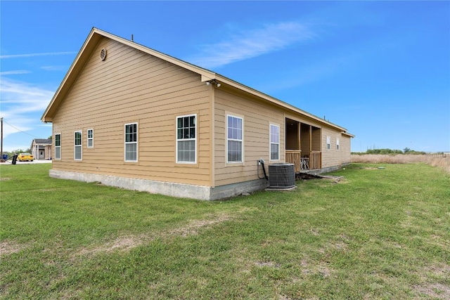 3424 S Old Bastrop Hwy, San Marcos, TX 78666 - view of home's exterior featuring central air condition unit and a yard