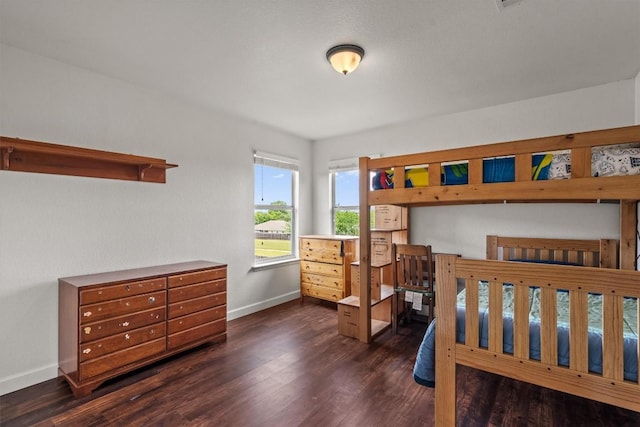 21016 Penny Royal Dr, Pflugerville, TX 78660 - bedroom with baseboards and wood finished floors