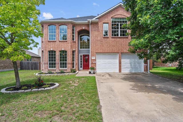view of front facade with concrete driveway, an attached garage, and brick siding