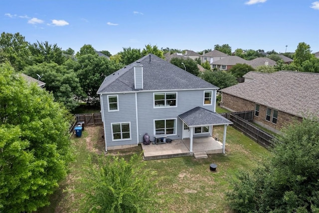 21016 Penny Royal Dr, Pflugerville, TX 78660 - rear view of property featuring a patio and roof with shingles