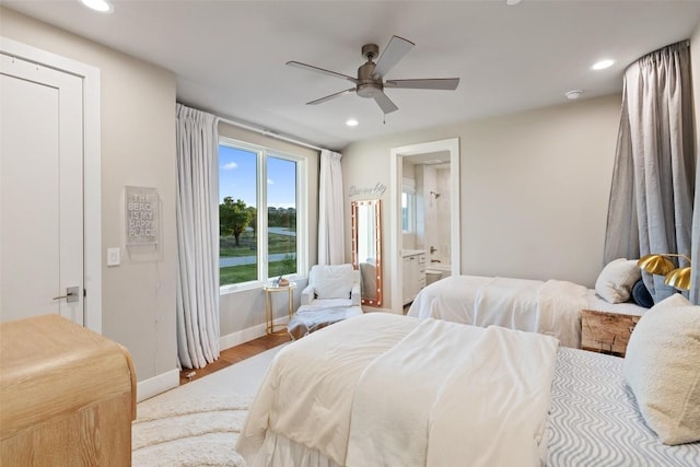 6404 Madrone Tree Ln, Austin, TX 78738 - bedroom with recessed lighting, baseboards, wood finished floors, connected bathroom, and ceiling fan