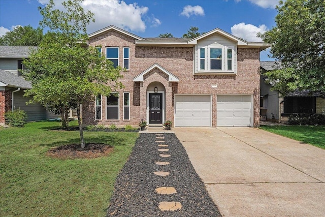 7605 Hawkeye Dr, Austin, TX 78749 - traditional home with brick siding, a front yard, and concrete driveway