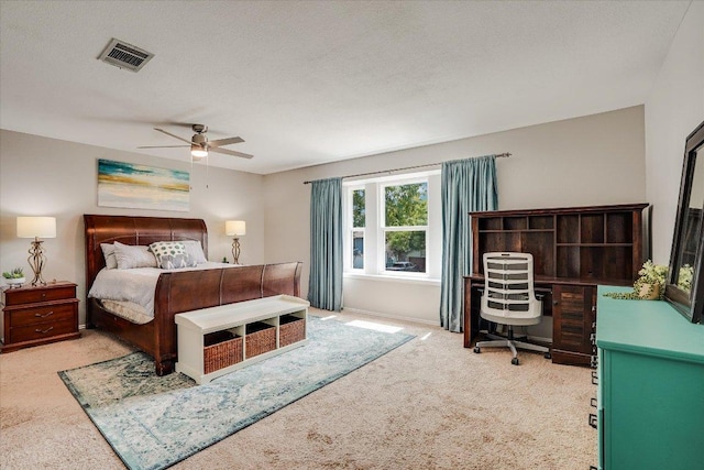 7605 Hawkeye Dr, Austin, TX 78749 - carpeted bedroom featuring an office area and ceiling fan