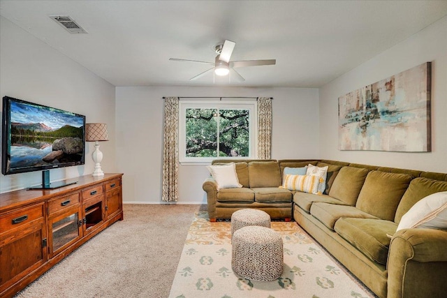 7605 Hawkeye Dr, Austin, TX 78749 - living room featuring light colored carpet, ceiling fan, and baseboards