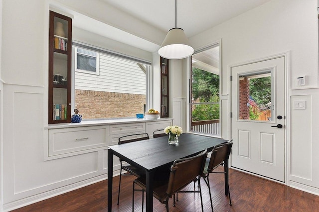 340 Palo Alto Way, Austin, TX 78732 - dining area with a decorative wall and dark wood-type flooring