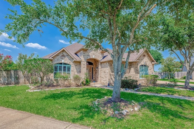 13403 Lakemeade Ct, Sugar Land, TX 77498 - french country inspired facade with brick siding and stone siding