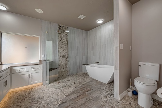13403 Lakemeade Ct, Sugar Land, TX 77498 - bathroom featuring a walk in shower, toilet, and a soaking tub