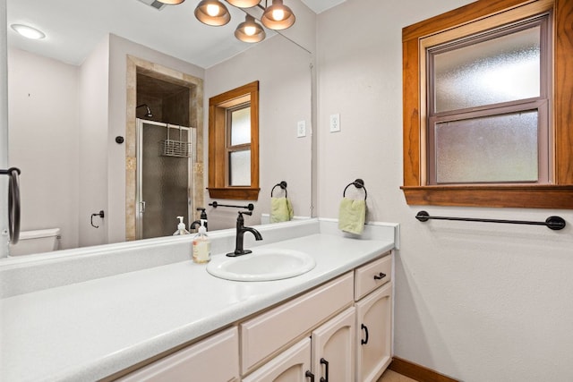 109 N Hill Top Dr, Boerne, TX 78006 - bathroom with a stall shower, vanity, and toilet